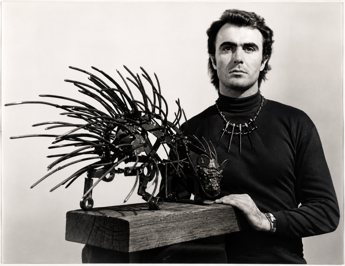 Kurt Lossgott, 1971, with an early welded-metal porcupine sculpture